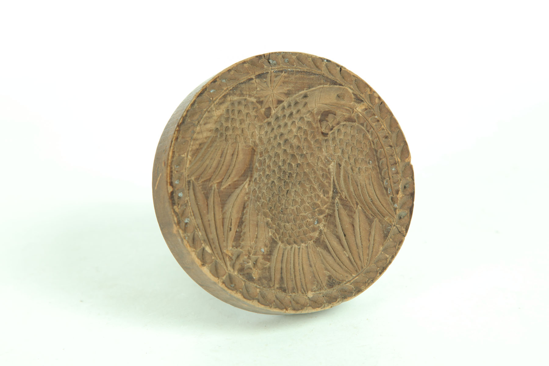 Appraisal: BUTTER PRINT American th century One-piece with well-carved eagle Age