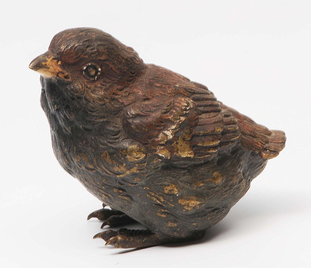 Appraisal: A COLD PAINTED BRONZE FIGURE of a juvenile sparrow cm