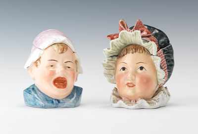 Appraisal: Two Majolica Child Head Tobacco Containers The first a crying