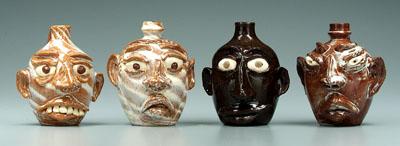 Appraisal: Four G F Cole face jugs General Forster Cole one