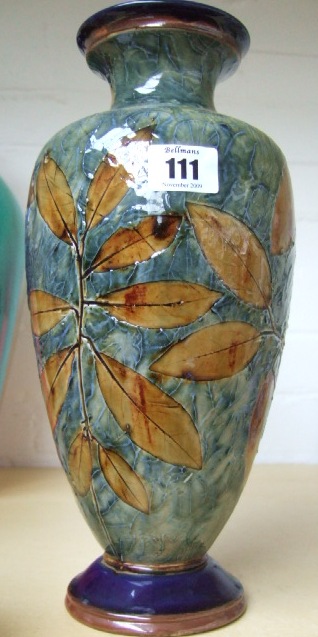 Appraisal: A Royal Doulton saltglaze stoneware vase decorated with autumn leaves