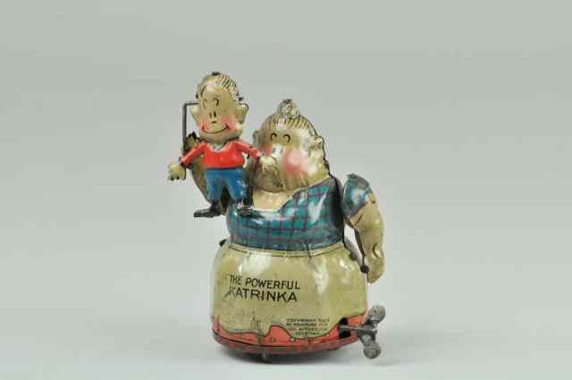 Appraisal: NIFTY ''POWERFUL KATRINKA'' Germany wind-up tin toy very colorful example