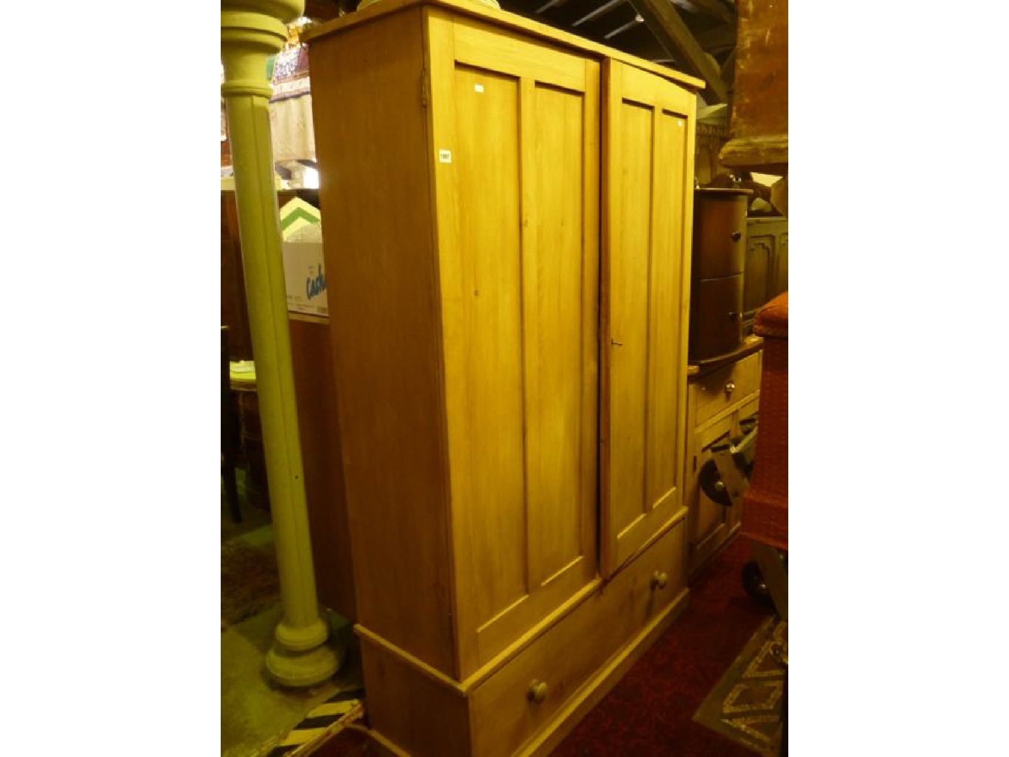 Appraisal: A Victorian style narrow freestanding kitchen cupboard enclosed by a