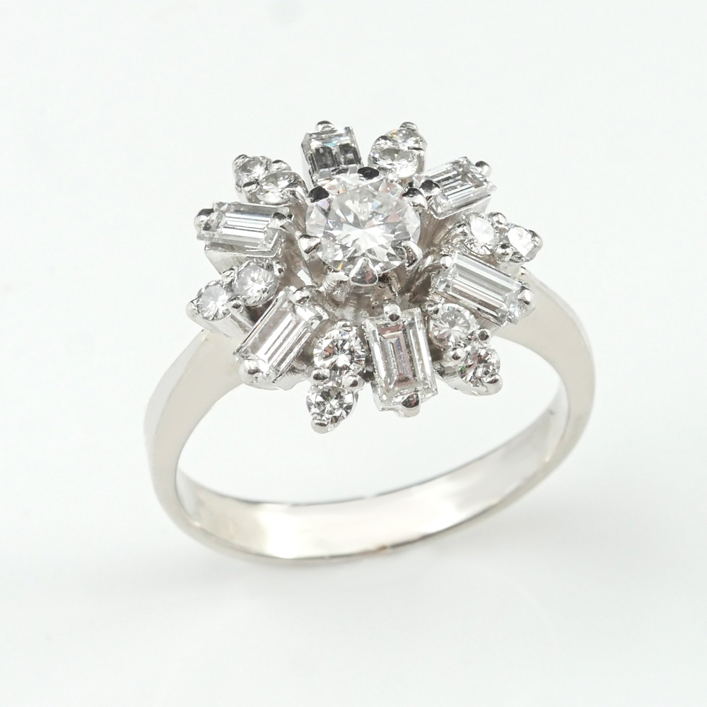 Appraisal: PLATINUM RETRO DECO CTW DIAMOND RING Center stone is brilliant