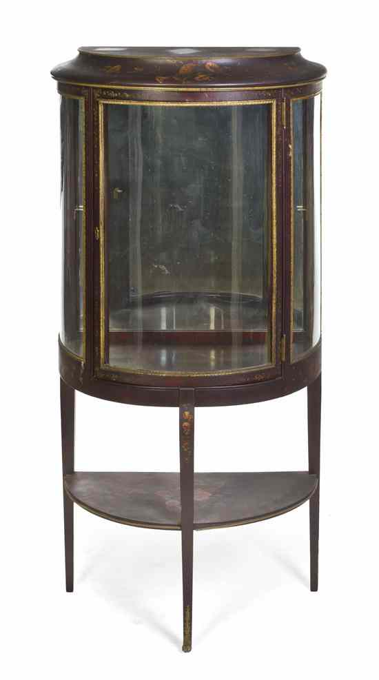 Appraisal: A Continental Painted Vitrine Cabinet having a downswept demilune cornice