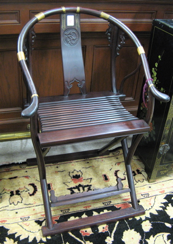 Appraisal: CHINESE ARMCHAIR AND SIDE TABLE The folding Ming-style armchair has