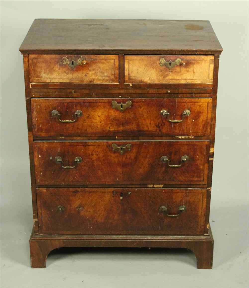 Appraisal: ENGLISH QUEEN ANNE WALNUT VENEERED CHEST OF DRAWERS with rectangular