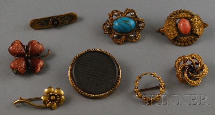 Appraisal: Eight Antique Gold and Gilt Brooches including a mourning pin