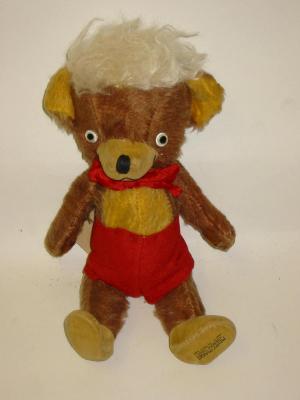 Appraisal: A Merrythought Pumpkin Head teddy bear covered in chocolate brown