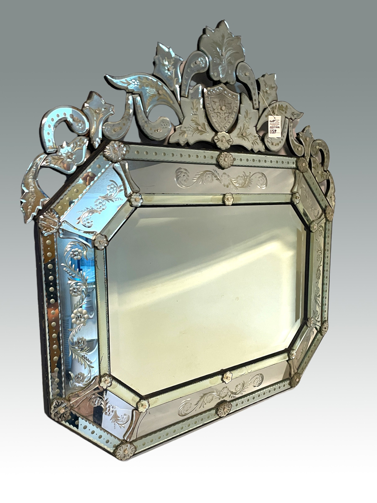 Appraisal: LARGE VENETIAN WALL MIRROR Having an overall scrolling foliate motif