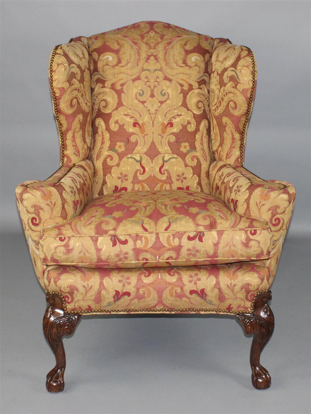 Appraisal: QUEEN ANNE STYLE WING CHAIR WITH NAILHEAD DECORATION shaped crest