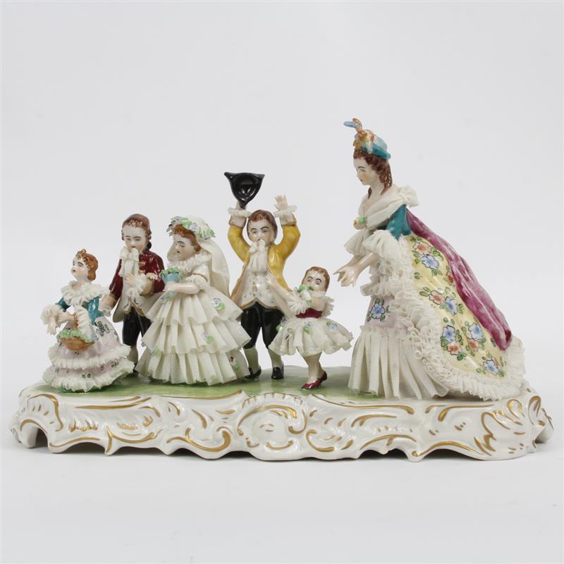 Appraisal: Dresden lace Muller Co German porcelain figure group Marked on