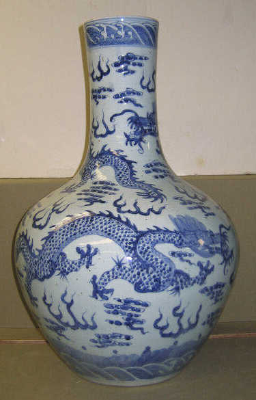 Appraisal: CHINESE BLUE AND WHITE PORCELAIN VASE Bottle form decorated with