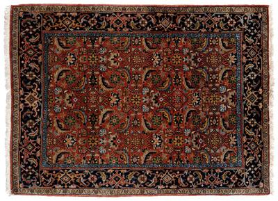 Appraisal: Indo-Persian rug Sarouk style with repeating designs on pale salmon