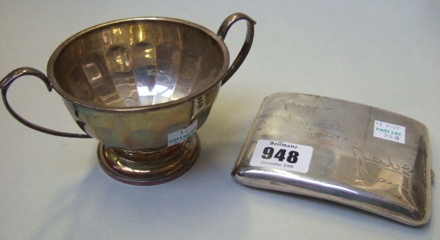 Appraisal: Silver comprising a curved rectangular cigarette case the exterior presentation