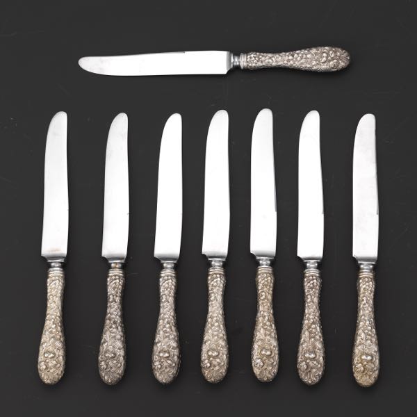 Appraisal: EIGHT STIEFF CO STERLING SILVER DINNER KNIVES ROSE PATTERN Cast