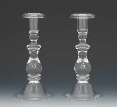 Appraisal: A Pair of Steuben Teardrop Candlesticks Introduced in the Teardrop