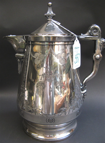 Appraisal: AN AMERICAN SILVER-PLATED WATER PITCHER by Meriden hinged lid porcelain