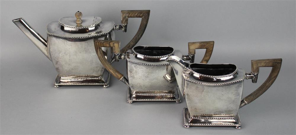 Appraisal: THREE-PIECE SILVER TEA SET including a covered tea pot an