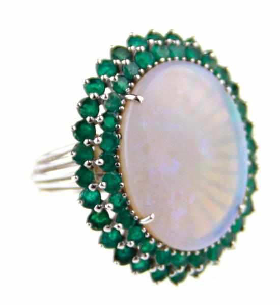 Appraisal: Opal and diamond cocktail ring x x mm oval cabochon-cut