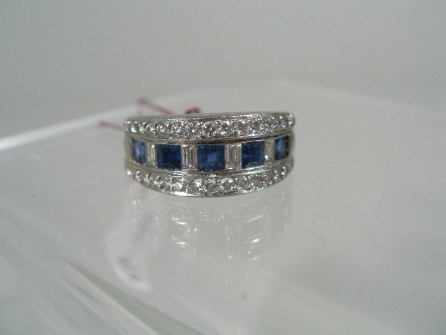 Appraisal: Ladies Sapphire and Diamond Ring heavy platinum mounting center row