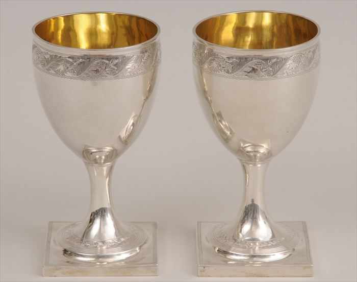 Appraisal: PAIR OF GEORGE III ENGRAVED SILVER GOBLETS Marks for George