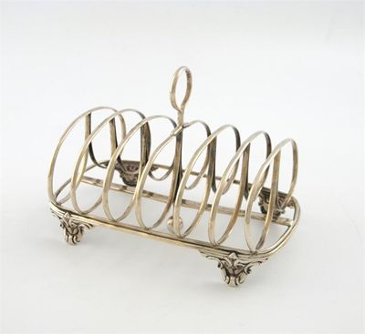 Appraisal: A Victorian silver seven bar toast rack by William Evens