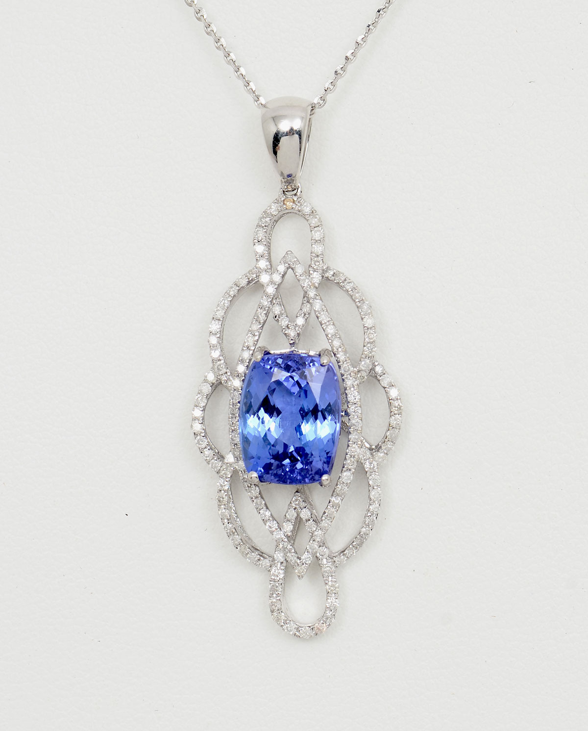 Appraisal: K TANZANITE DIAMOND NECKLACE Featured CT tanzanite is set in