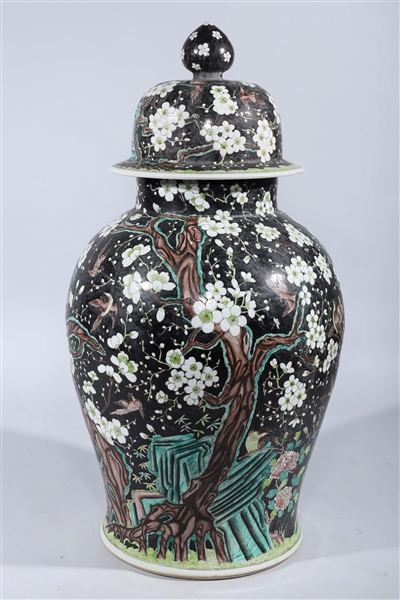 Appraisal: Large and elaborate Chinese enameled porcelain famille noir covered vase