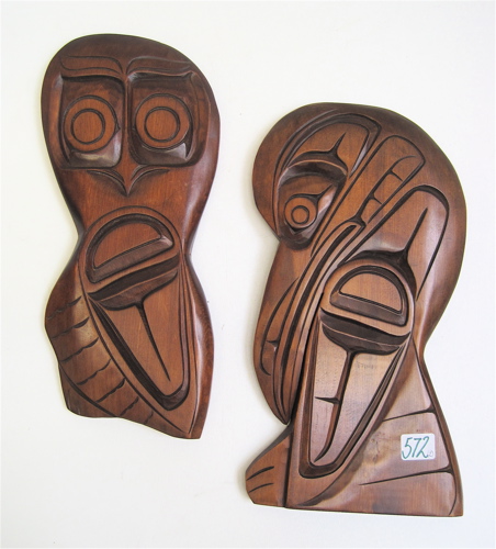 Appraisal: PAIR CEDAR WALL PLAQUES BY GEORGE MATILPI b member Kwakiutl