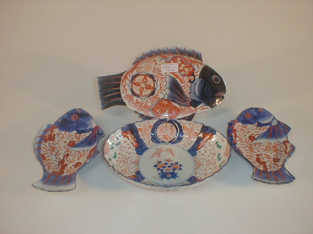 Appraisal: Three Japanese Imari fish platters modelled as flat fish painted