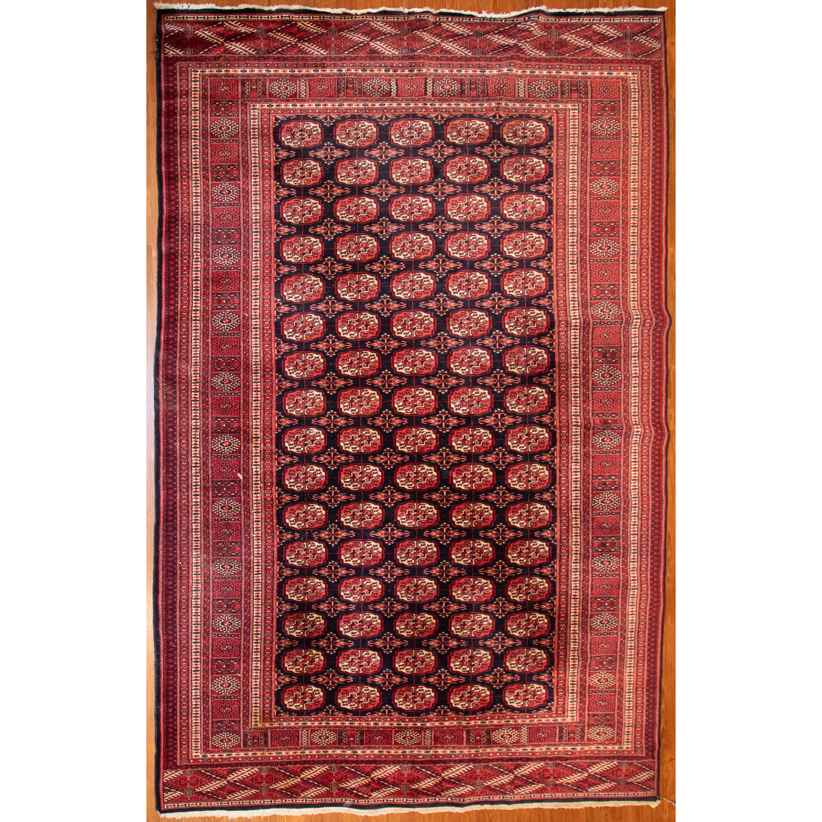 Appraisal: BOKHARA RUG PAKISTAN X Third quarter- th century hand-knotted wool