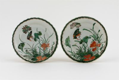 Appraisal: A pair of Chinese famille verte small dishes each painted