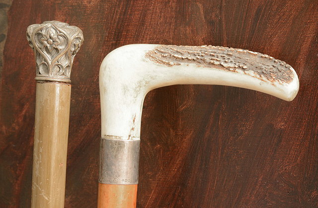 Appraisal: AN OLD MALACCA WALKING CANE with antler handle and silver