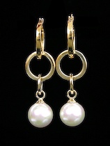 Appraisal: A Pair of Majorica Earrings Gold-toned sterling silver circle dangling