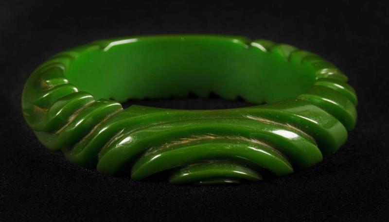 Appraisal: Bakelite Carved Geometric Green Bracelet Condition Near Mint Size -