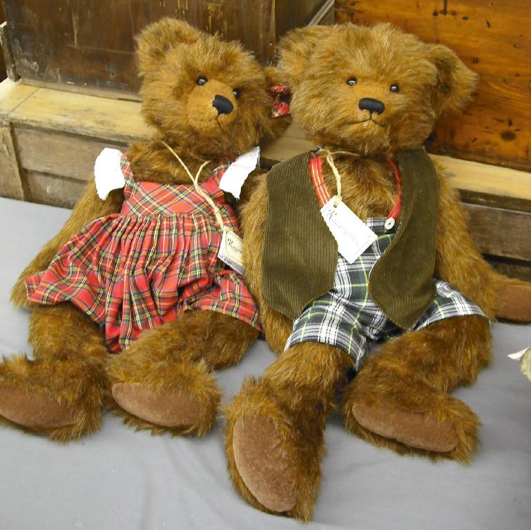 Appraisal: Pair of 'Ragamuffin' hand made teddy bears with jointed limbs