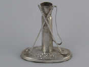 Appraisal: A silver toothpick or cocktail stick holder formed as a