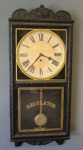 Appraisal: Waterbury Regulator clock in an ebonized oak case h x