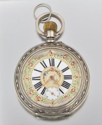 Appraisal: An Oversized Silver Pocket Watch Open face pocket watch with