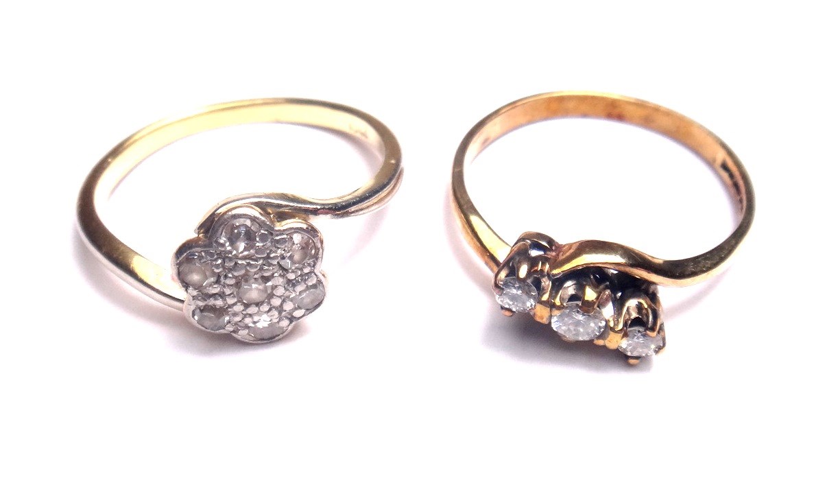 Appraisal: A gold and diamond set seven stone cluster ring mounted