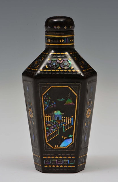 Appraisal: A CHINESE LACQUER BURGETTE SNUFF BOTTLE of octagonal form decorated