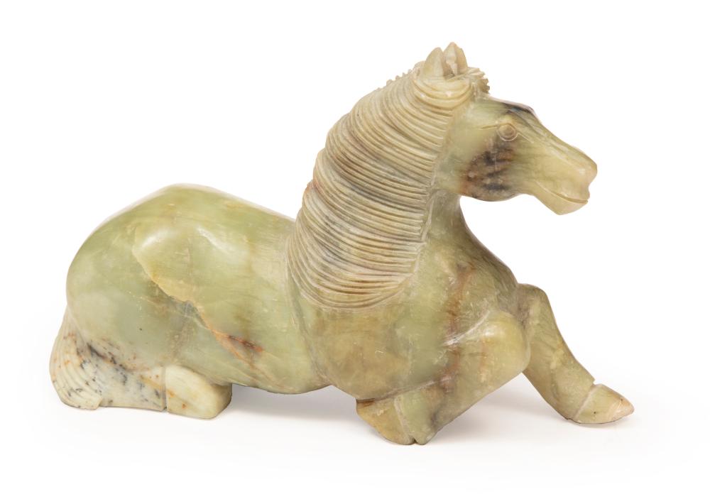 Appraisal: Chinese Hardstone Horse modeled recumbent with one leg forward h