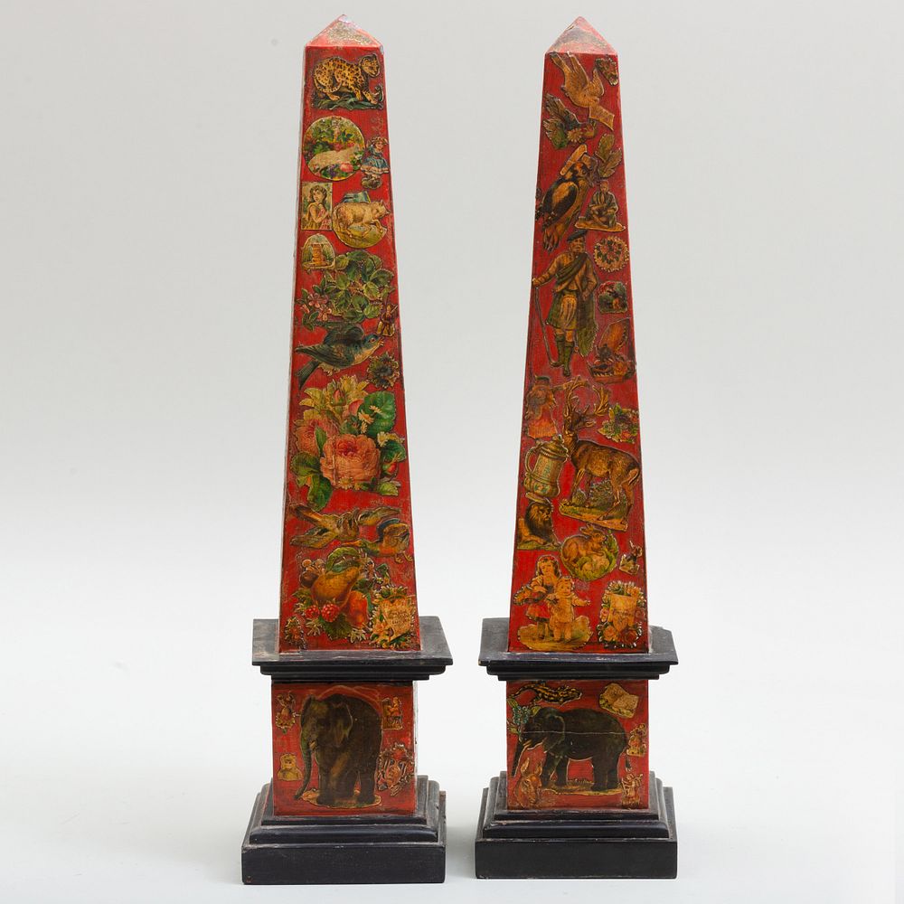 Appraisal: Pair of Decalcomania Decorated Red Painted Stone Obelisks x x