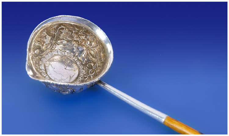 Appraisal: Silver 'Toddy' Ladle with a Queen Anne silver coin to