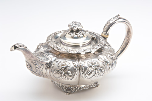 Appraisal: George IV teapot melon ribbed with floral decoration in high