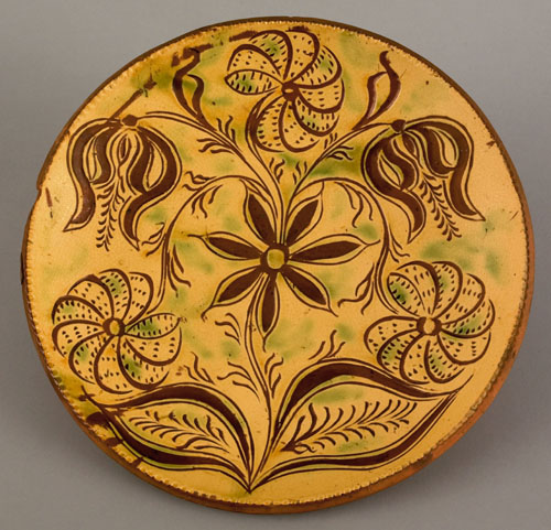 Appraisal: Bucks County Haycock Township Pennsylvania sgraffito decorated redware plate attributed