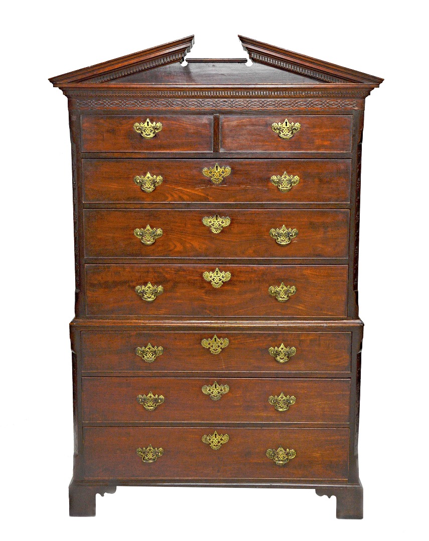 Appraisal: A George II mahogany chest on chest with architectural cornice