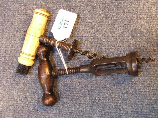 Appraisal: AN ANTIQUE STEEL CORK SCREW with turned bone handle inset