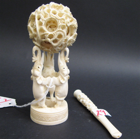 Appraisal: CHINESE IVORY MYSTERY BALL CIGARETTE HOLDER the carved ball with